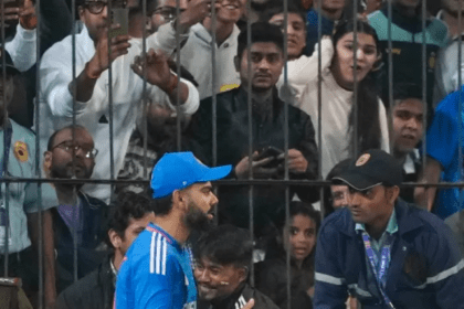 A man hugs Virat Kohli during the 2nd T20I.