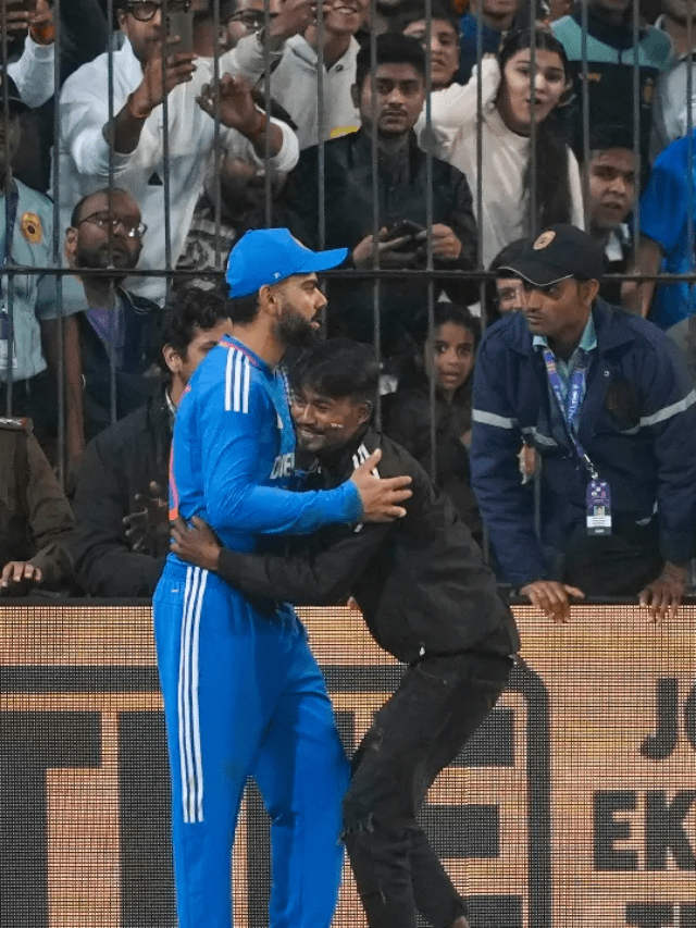 A man hugs Virat Kohli during the 2nd T20I.